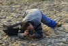 funny-pictures-of-photographers-posing-Guy-on-ground.jpg